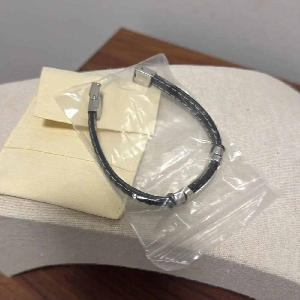 NWOT Men's Braided Black Leather & Stainless Steel Bracelet.